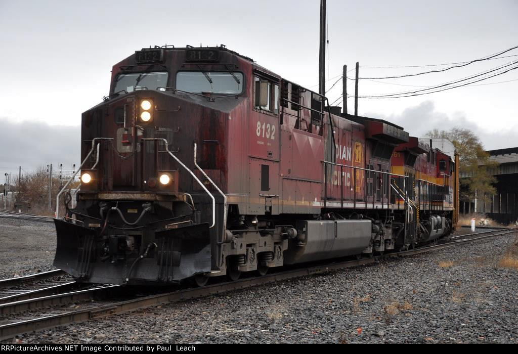 Dirty GE leads a vehicle train west